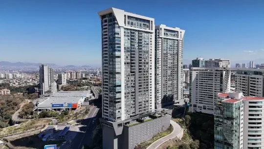 Fachada de Manigua Casa Club con Sistema EIFS